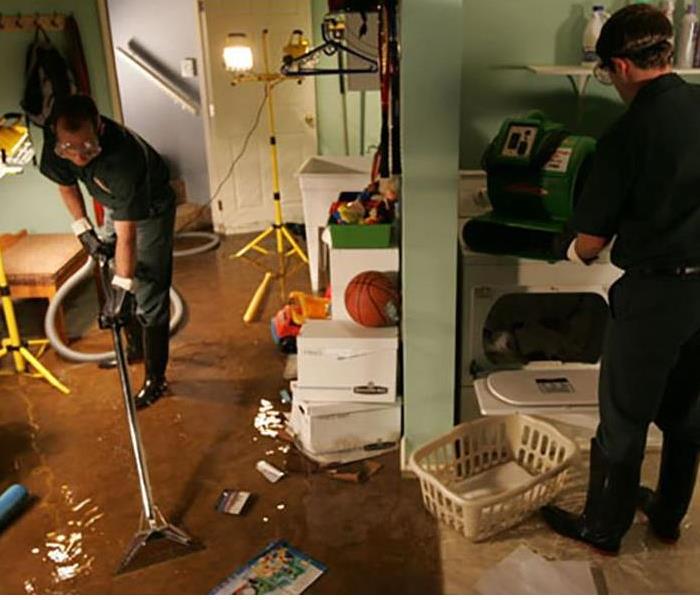 A basement is flooded after a storm.